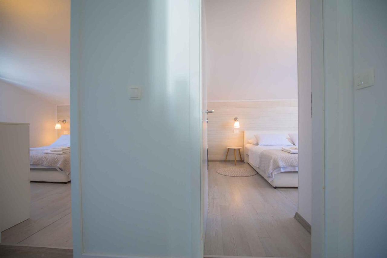 Apartments In Rogoznica 36019 Bagian luar foto
