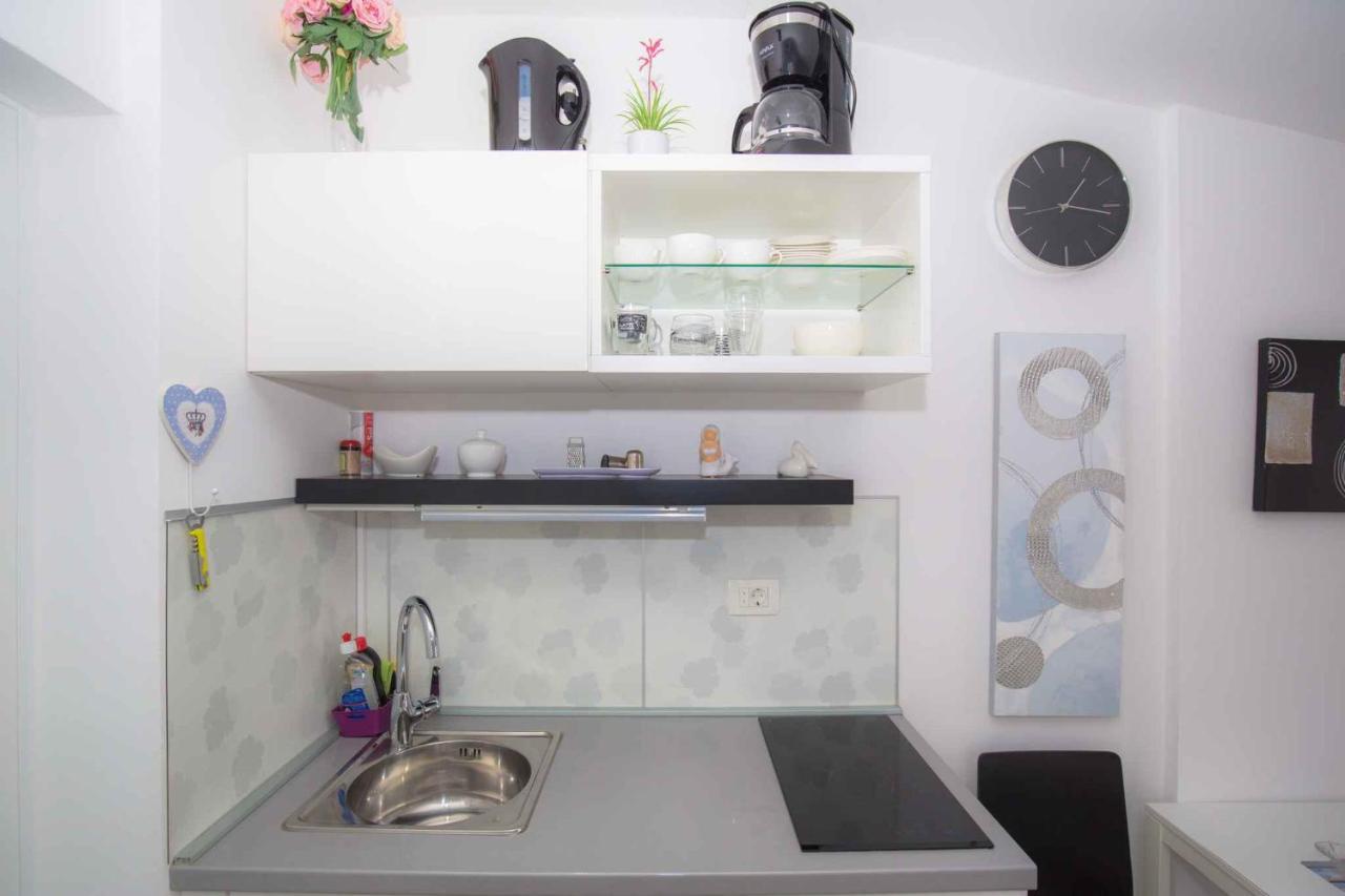 Apartments In Rogoznica 36019 Bagian luar foto
