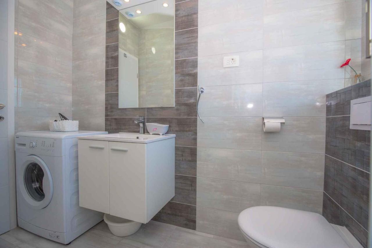 Apartments In Rogoznica 36019 Bagian luar foto