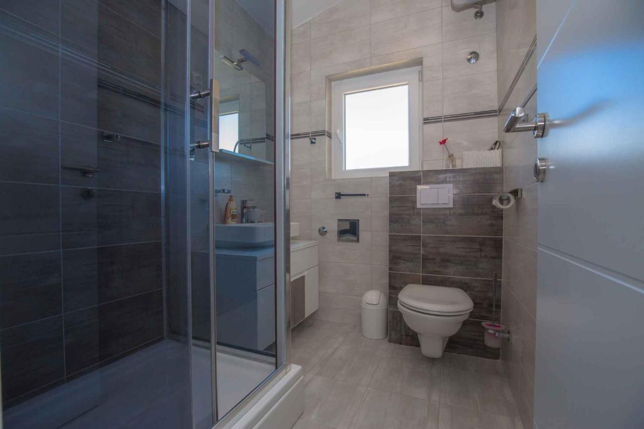 Apartments In Rogoznica 36019 Bagian luar foto