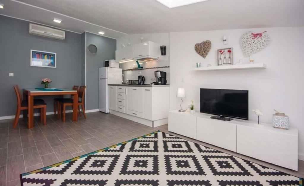 Apartments In Rogoznica 36019 Bagian luar foto